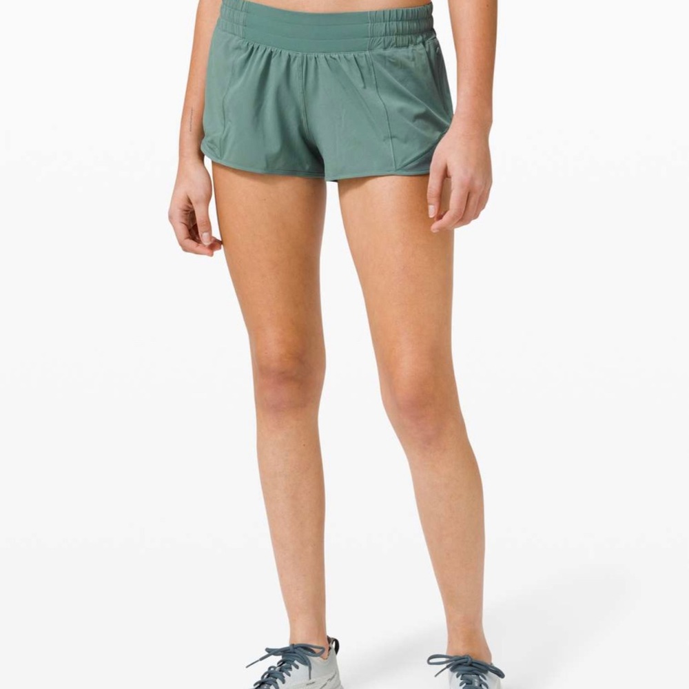 light green/teal lululemon hotty hot shirt 2.5” size 6 tidewater teal